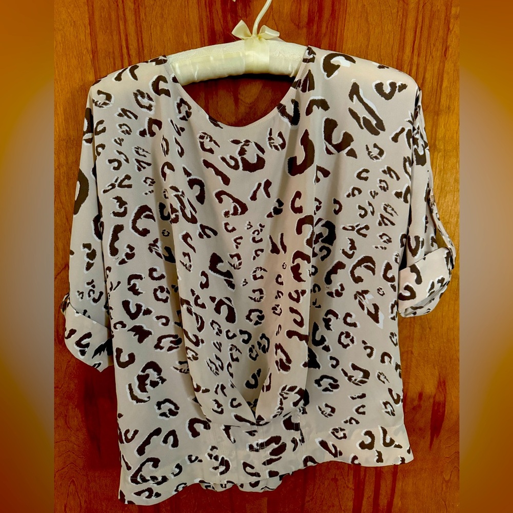 BCBGMaxAzria “Jayne” blouse. XS never worn NWOT color is Corozocmbo